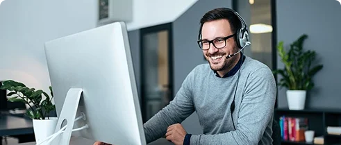 a men wearing headphone to discuss about phone business services